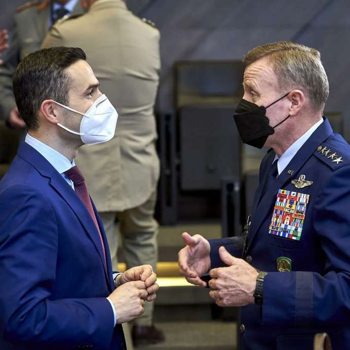 Defence Minister Matej Tonin speaking to a military man