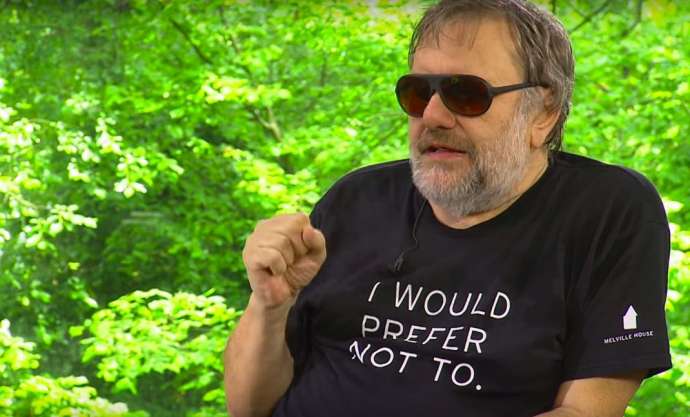 Žižek in &quot;They Live&quot; sunglasses and a Melville T-shirt