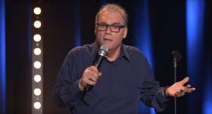 Boris Kobal, on stage with his stand-up act