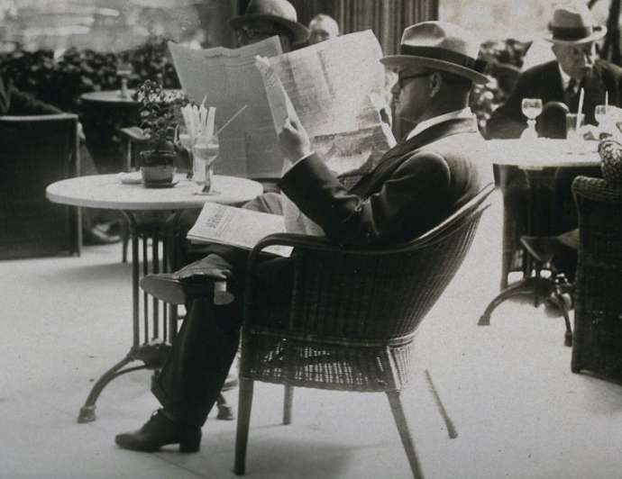 Gustav Stresemann reading newspapers
