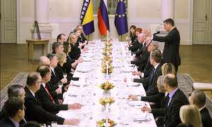 President Pahor, standing, speaks to the group