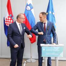 Croatia's Gordan Grlić Radman and Slovenia's Anže Logar maintain their distance and keep their cool