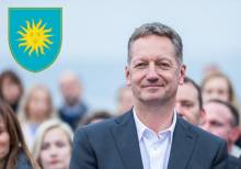 Mayor Popovič and the symbol of Koper