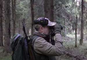 A hunter looking for a bear