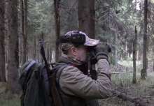 A hunter looking for a bear