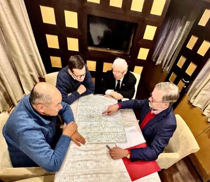 PM Janša (left) and other leaders on the train to Ukraine, yesterday